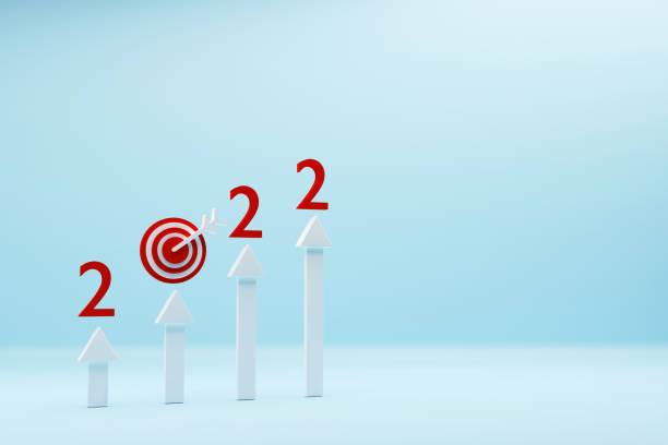 istock 2022 Growth chart with arrows moving up and Bull's eye target 1348013423