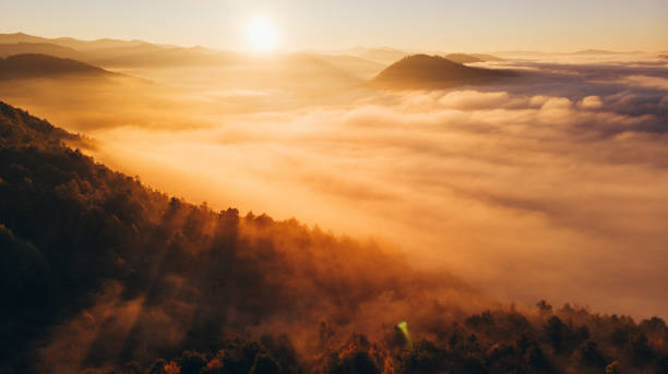 istock A beautiful sunrise over a foggy mountain 1348015677