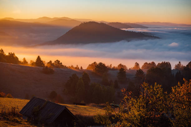 istock Dreamy sunrise landscape over the mountains 1348016513