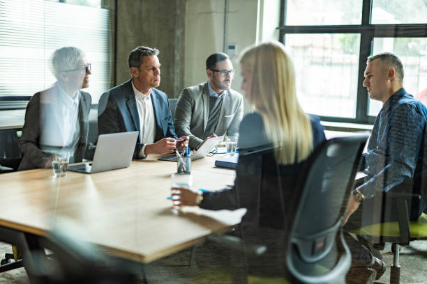 istock Business colleagues talking on a meeting in the office. 1348016548