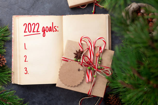 istock Christmas gift box with craft decor and vintage notebook 1348017707