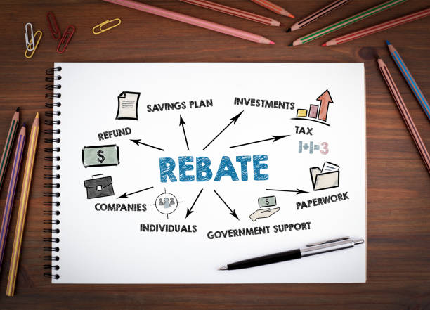 istock Rebate. Refund, Savings plan, Tax and Government Support concept. Notebooks, pen and colored pencils on a wooden table 1348019200