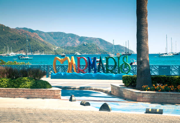 Inscription Marmaris - southern resort by the sea Inscription Marmaris - southern resort by the sea - summer day in the resort town marmaris stock pictures, royalty-free photos & images
