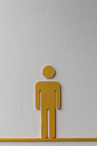 Gold / yellow figure of man for a public toilet