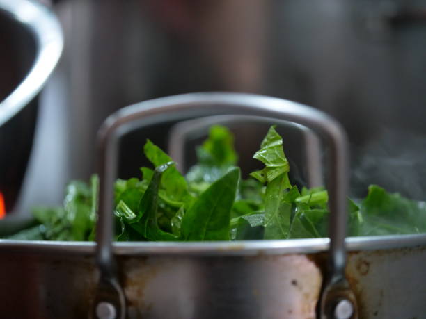 istock spinach leaves in a skillet 1348026380