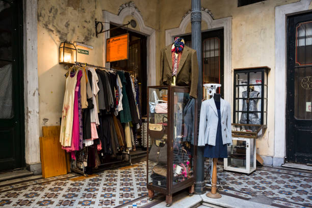 Horizontal view of a vintage clothing store in Defensa Alleway (Pasaje de la Defensa, former House of the Ezeiza family, now shopping arcade), San Telmo, Buenos Aires