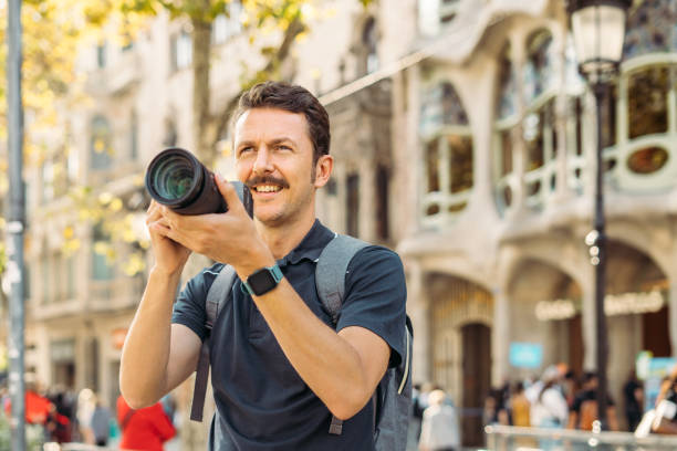 istock Man taking pictures in Barcelona 1348028200