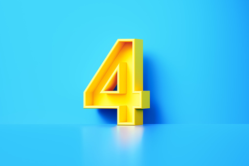 Yellow number four sitting on blue background. Horizontal composition with copy space.