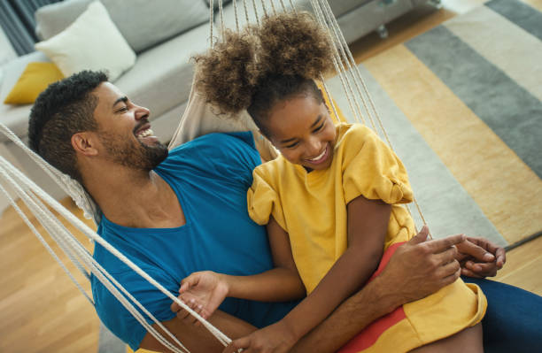 istock Father and daughter having fun at home. 1348028292