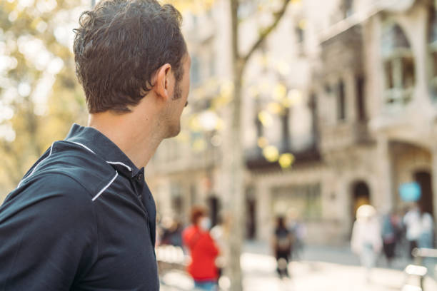 istock Man taking pictures in Barcelona 1348029835