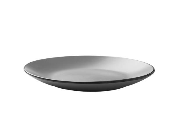 istock Grey ceramic round plate isolated over white background. perspective view 1348030947