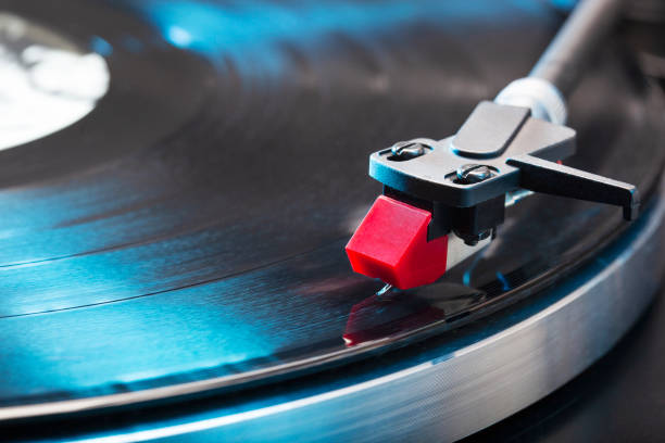 istock Vintage turntable with the needle on a lp 1348033055