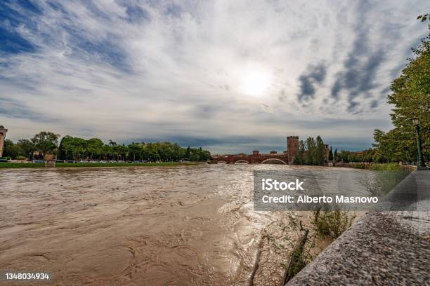 Adige River In Flood In Verona Downtown After Several Violent Storms Stock Photo - Download Image Now