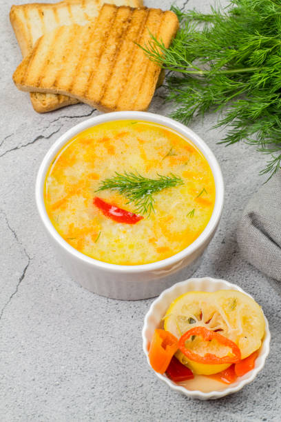 istock Deep plate of chicken rice soup on the table 1348035732