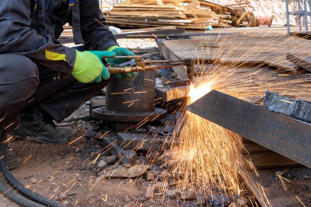 istock The worker is cutting carbon steel material with oxy-fuel process. Oxy-fuel cutting are processes that use fuel gases (or liquid fuels such as gasoline) and oxygen to weld or cut metals. 1348041783
