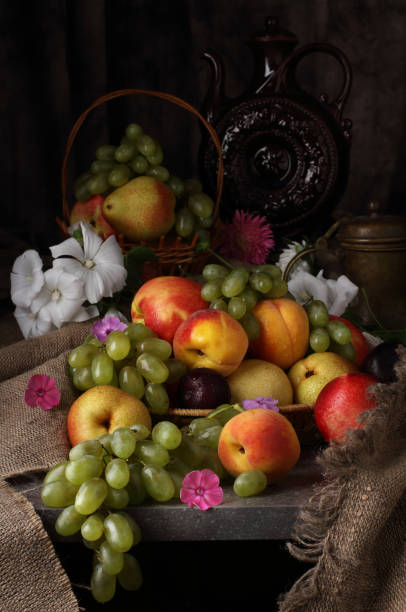 istock Still life with fruit and vintage jug in retro style 1348044274
