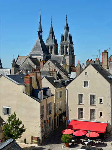 Dinan, Cotes-d-Armor / France - 19 August 2019:  tourists enjoy visiting old town Dinan in Brittany and dining out in the restaurants