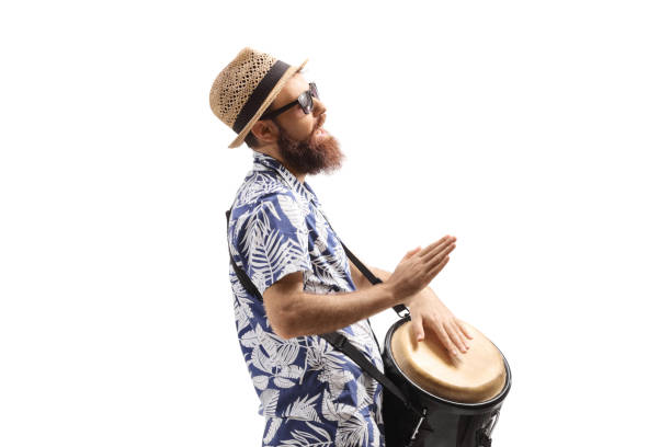 istock Profile shot of a bearded man playing conga drums and singing 1348049535