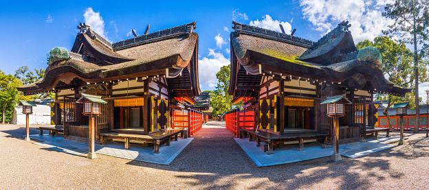 Traditionally thatched wooden pavilions at the Sumiyoshi Taisha shrine in Osaka, Japan.