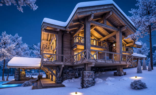 istock 3d rendering of modern cozy chalet in winter night 1348050721