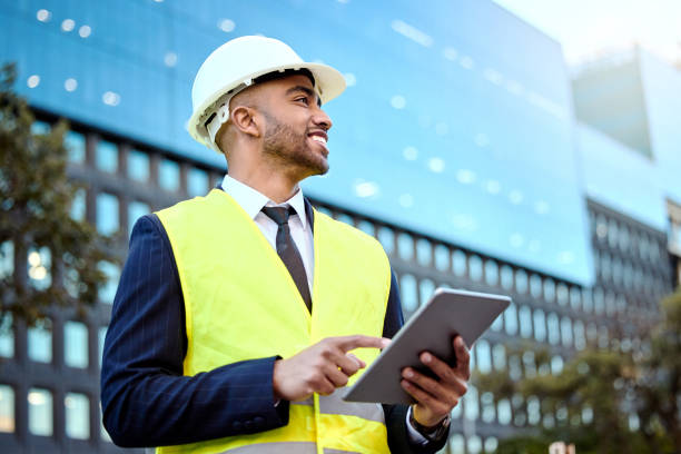 istock Shot of a young businessman on a construction site using a digital tablet 1348061284
