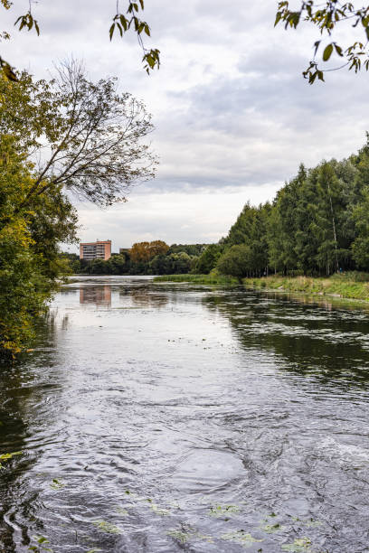 istock river flows into pond in Moscow city on cloudy day 1348061532