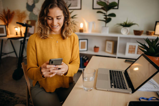 istock Young woman in a home office 1348063559
