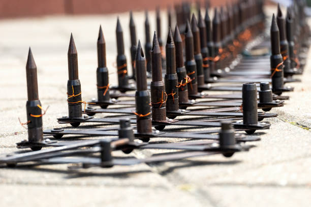 Police road block with metal a sharp  spikes