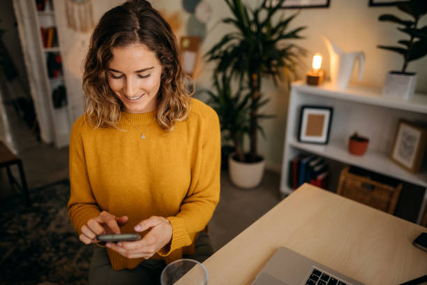 istock Young woman in a home office 1348065116