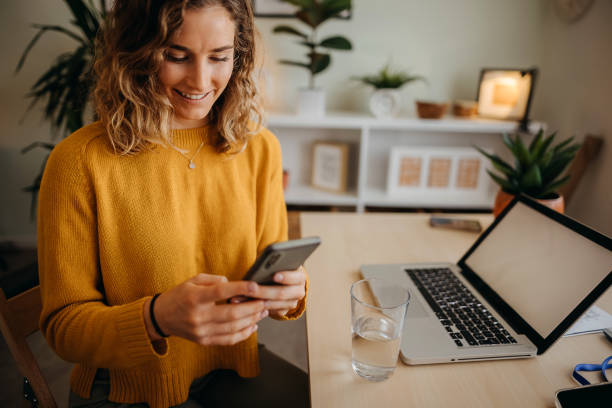 istock Young woman in a home office 1348065260