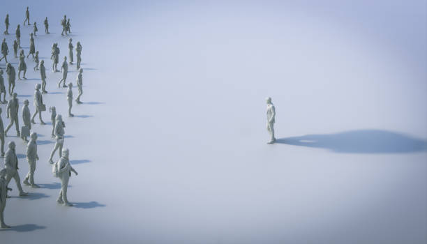 istock people looking at a man with a very large shadow. 1348069722