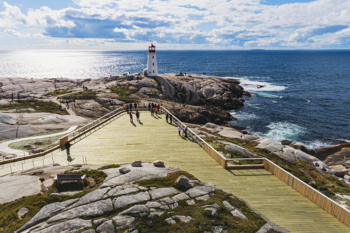 Aerial drone view of Peggy's Cove lighthouse and the newly completed accessible observation deck & walkways.