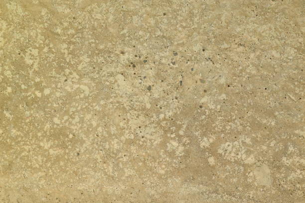 istock Texture of old sand concrete wall for background. 1348071747