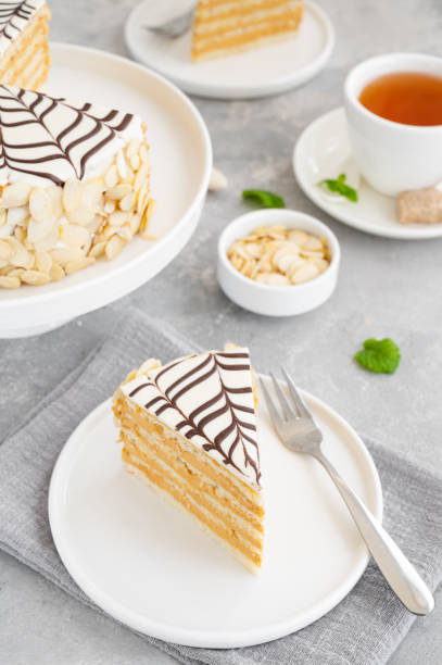 istock Traditional Esterhazy cake with almonds and pralines on a gray concrete background. Selective focus. Copy space. 1348071998