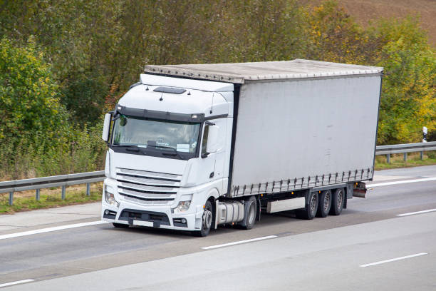 istock Truck on a highway 1348073386