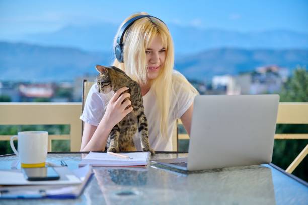 istock Female student studies at home online using a laptop 1348073439