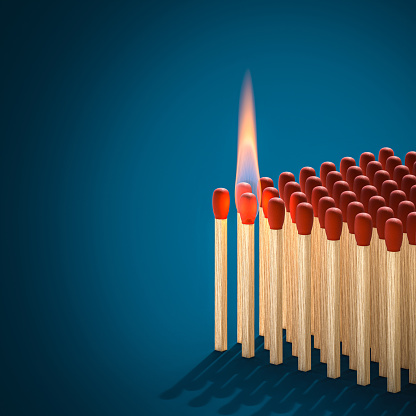 lit match ready to ignite fire on other matches. 3d render