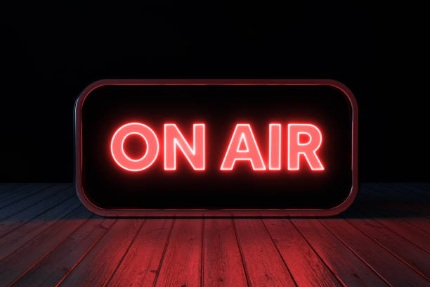 istock On Air Red Sign on a Live Online Studio or Radio Desk. 3d Rendering 1348075015
