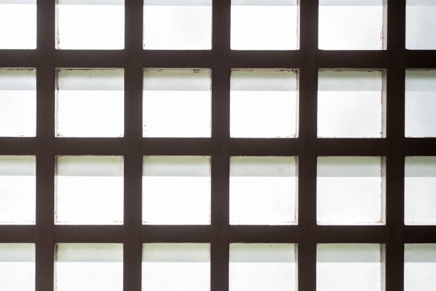 istock Close up blocks wall allowing light to enter building interior. 1348076201