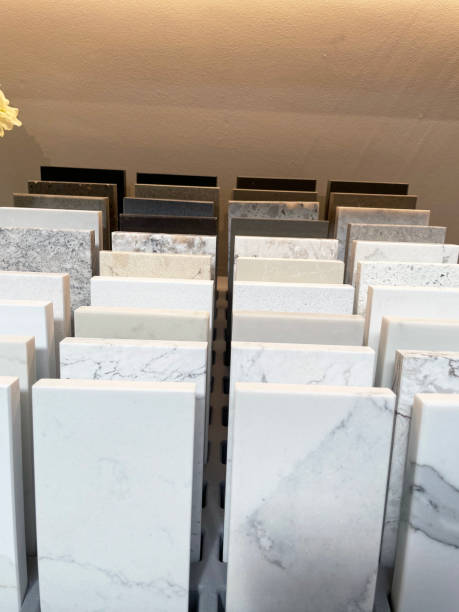 istock Image of stacks of tile samples in rows, natural stone tiles, granite, limestone, marble, slate and travertine 1348077543