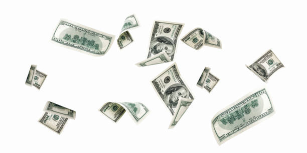 istock Money stack. Hundred dollars of America. Falling money isolated, us bill white background. 1348077793