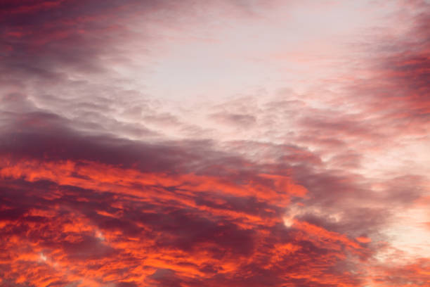 istock Colorful warm clouds on sky at sunset 1348077900