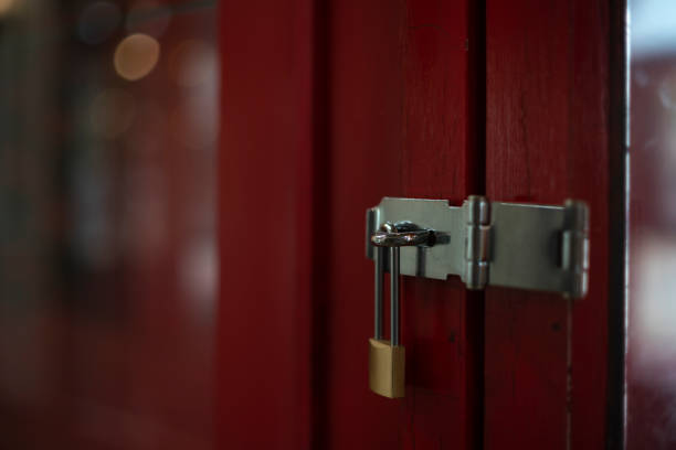 istock Close up old lock on the door 1348078771