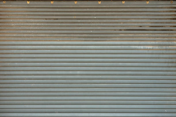 istock Old metal roller door background photo 1348078797