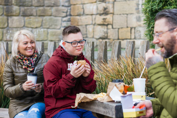 istock Enjoying Food With Mum and Dad 1348079346