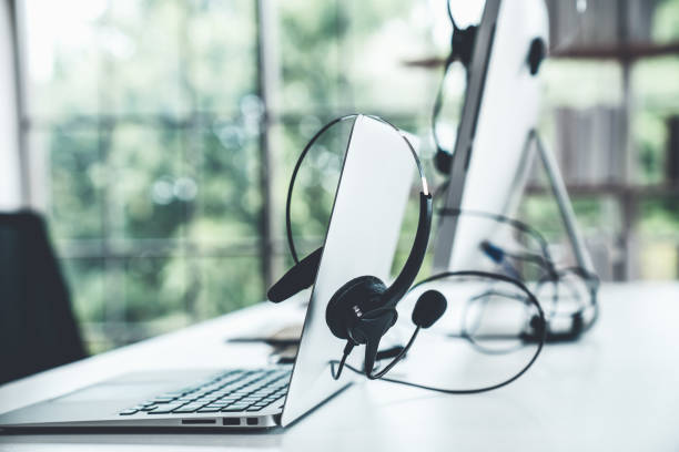 istock Headset and customer support equipment at call center ready for actively service 1348080527
