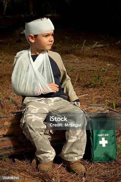 First Aid In The Forest Stock Photo - Download Image Now - Child, First Aid Kit, Physical Injury