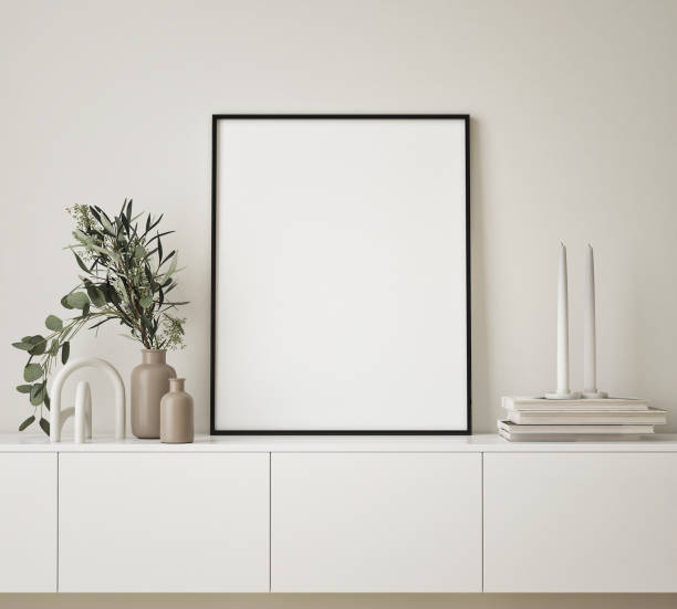 istock mock up poster frame in modern interior background, living room, Scandinavian style, 3D render, 3D illustration 1348083391