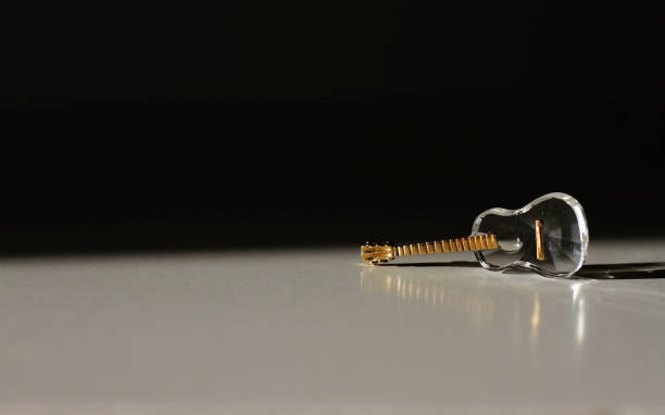 istock Miniature glass guitar 1348084635