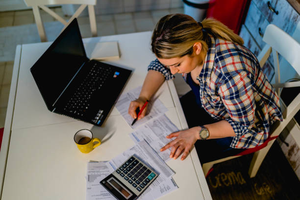 istock Woman managing finances 1348085045